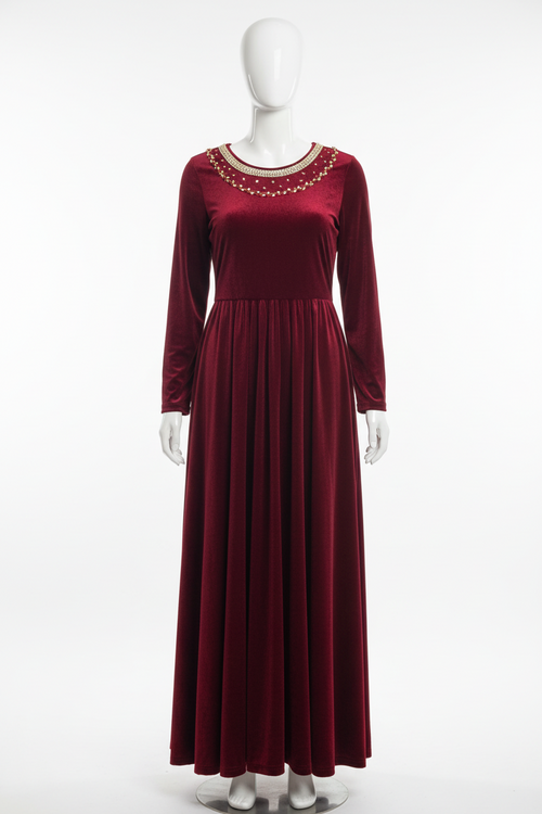 Red velvet gown on mannequin with plain background